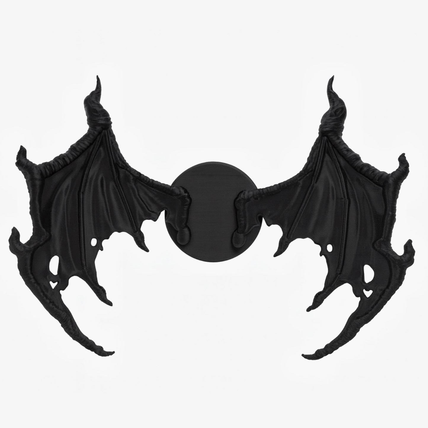 Black bat-shaped wings on a white background
